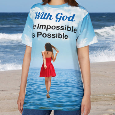 Soft, breathable activewear shirt with “Impossible Woman” design, message “The Impossible Is Possible with God,” spiritual shirt for women walking without limitations, woman wearing shirt